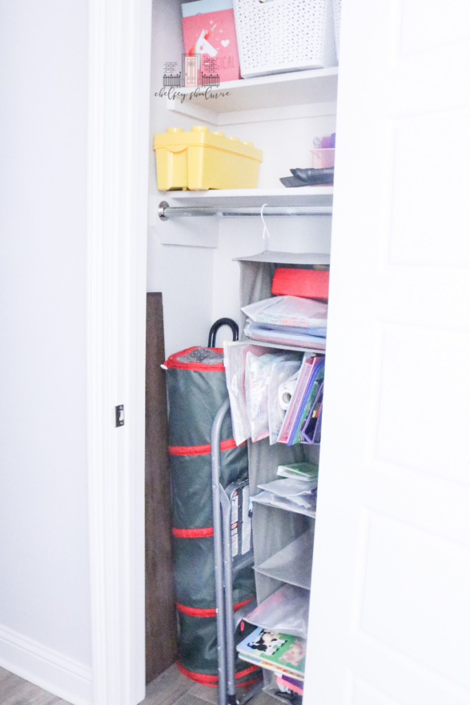 Linen closet organization using hanging storage and baskets to organize your linen closet.